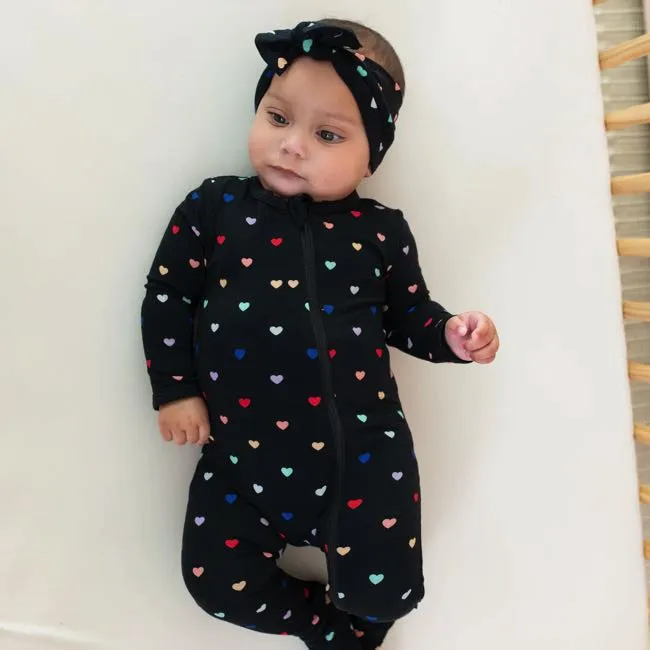 Kyte Baby Printed Zippered Footie in Midnight Rainbow Heart